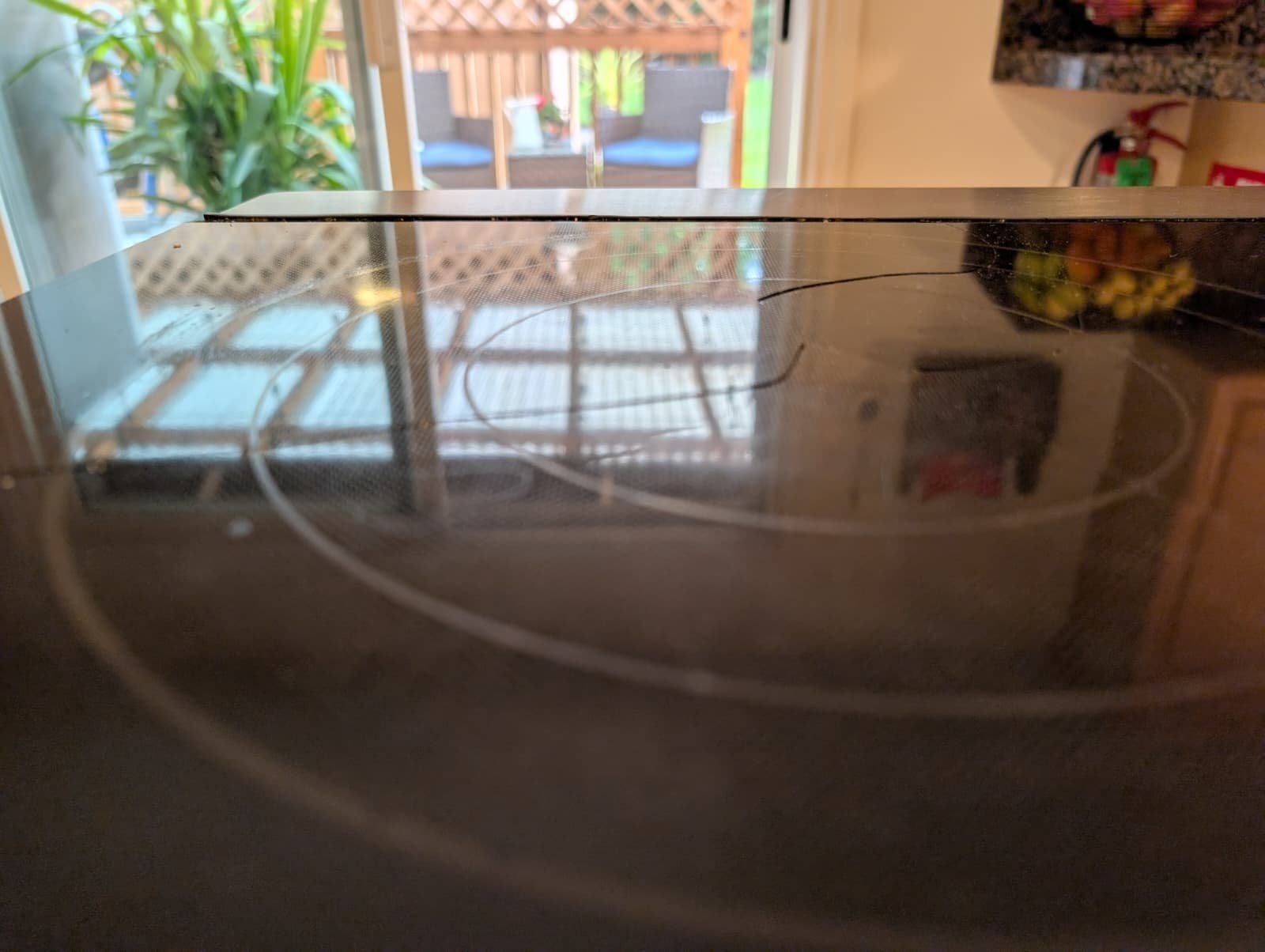 Why You Shouldn’t Cook on a Cracked Glass Stove (And Exactly How We Fix It) 10 Close up of a dangerous crack on a glass electric stove top.